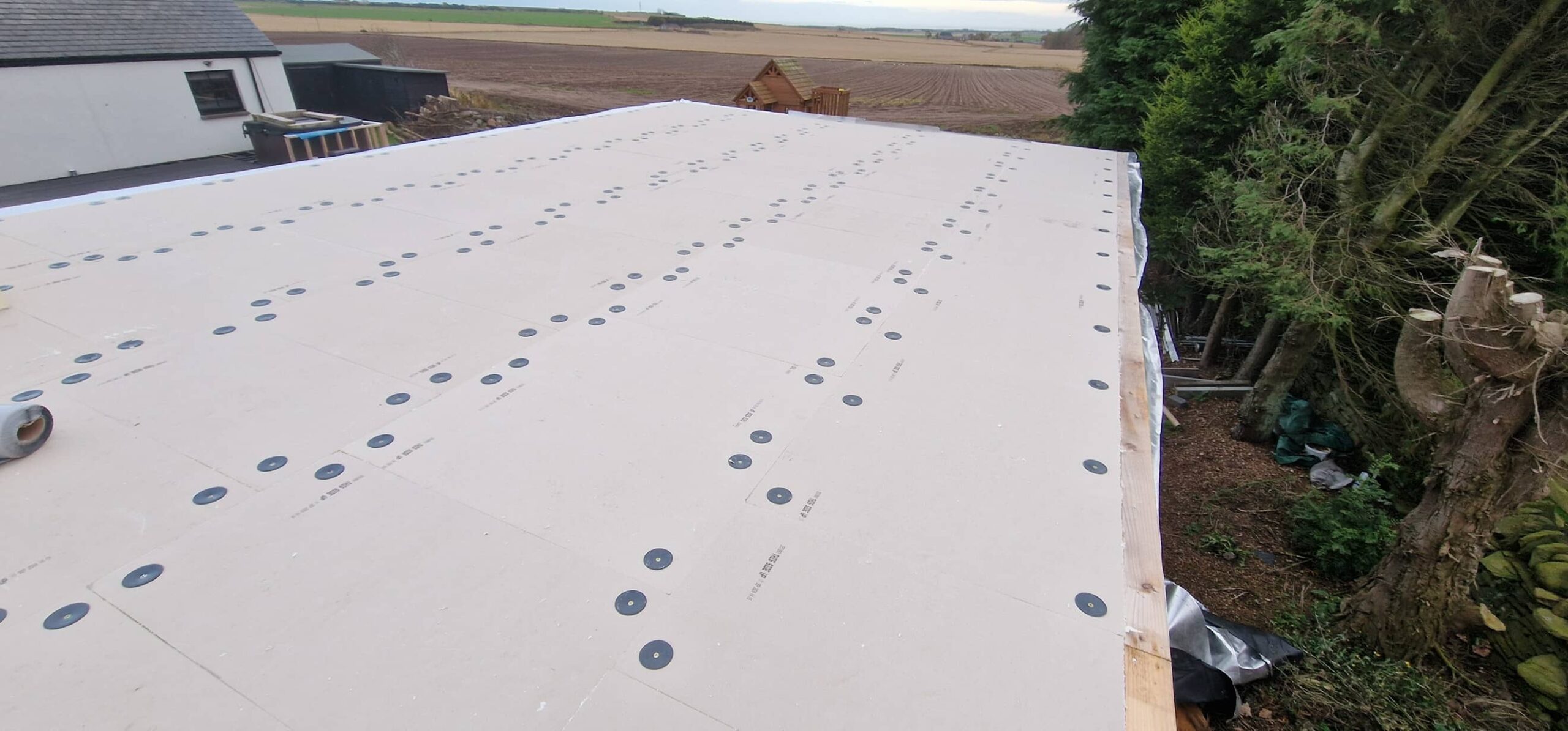 120mm insulation installation on a flat roof