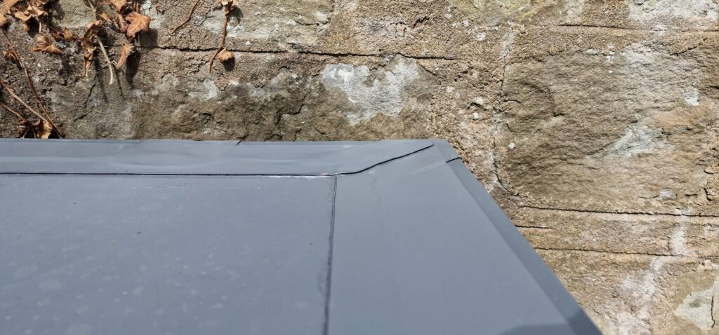 Single ply garage roof corner